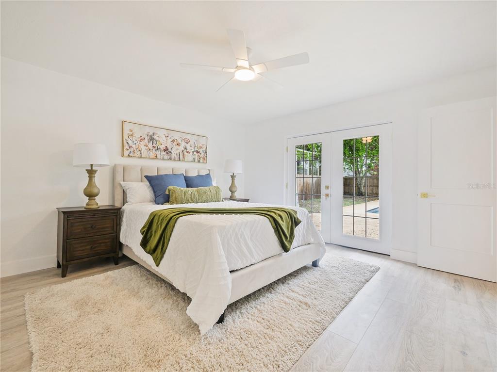 2466 Fieldingwood Road Maitland, FL 32751 - Photo 10 of 29 a bed sitting in a bedroom next to a window