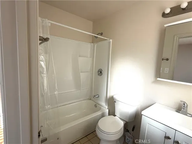 a view of hallway with wooden floor