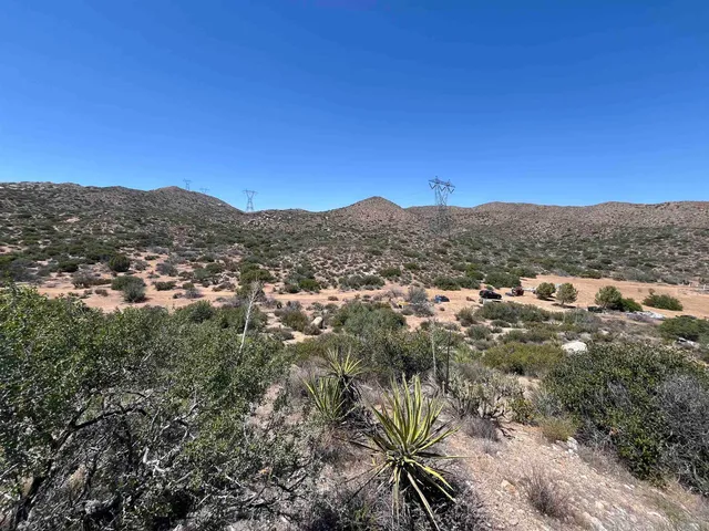 a view of a city with mountains in the background