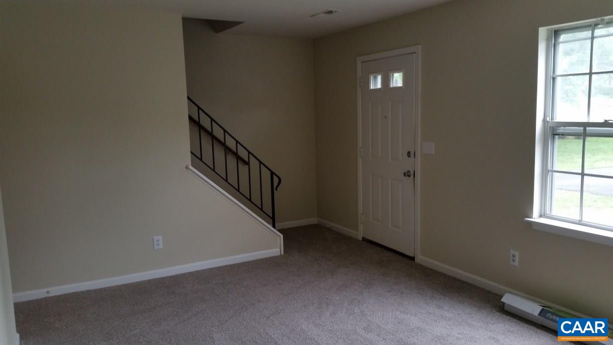 1640 Townwood Court Charlottesville, VA 22901 - Photo 3 of 11 a view of an entryway with wooden floor and staircase