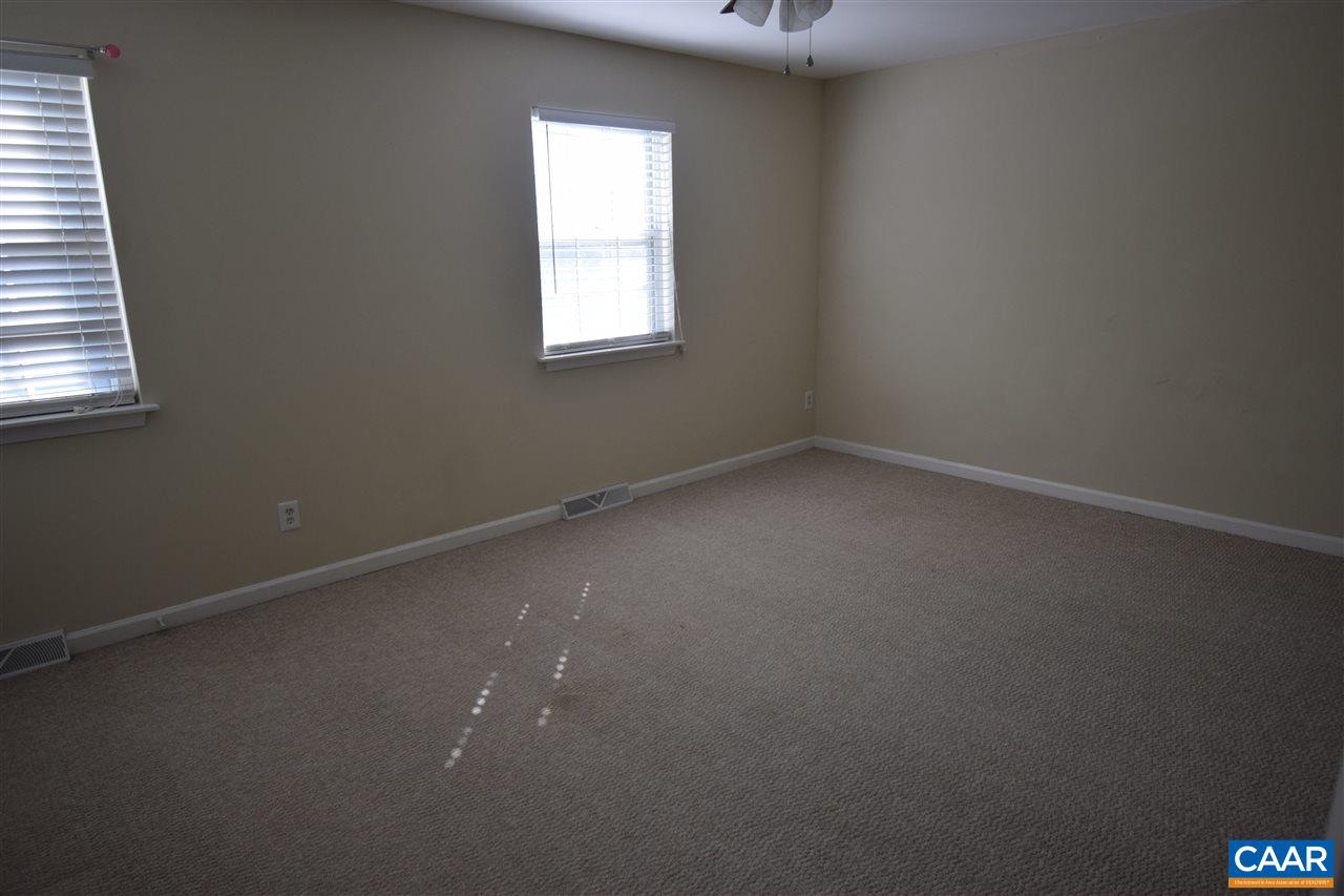 1640 Townwood Court Charlottesville, VA 22901 - Photo 7 of 11 an empty room with a window