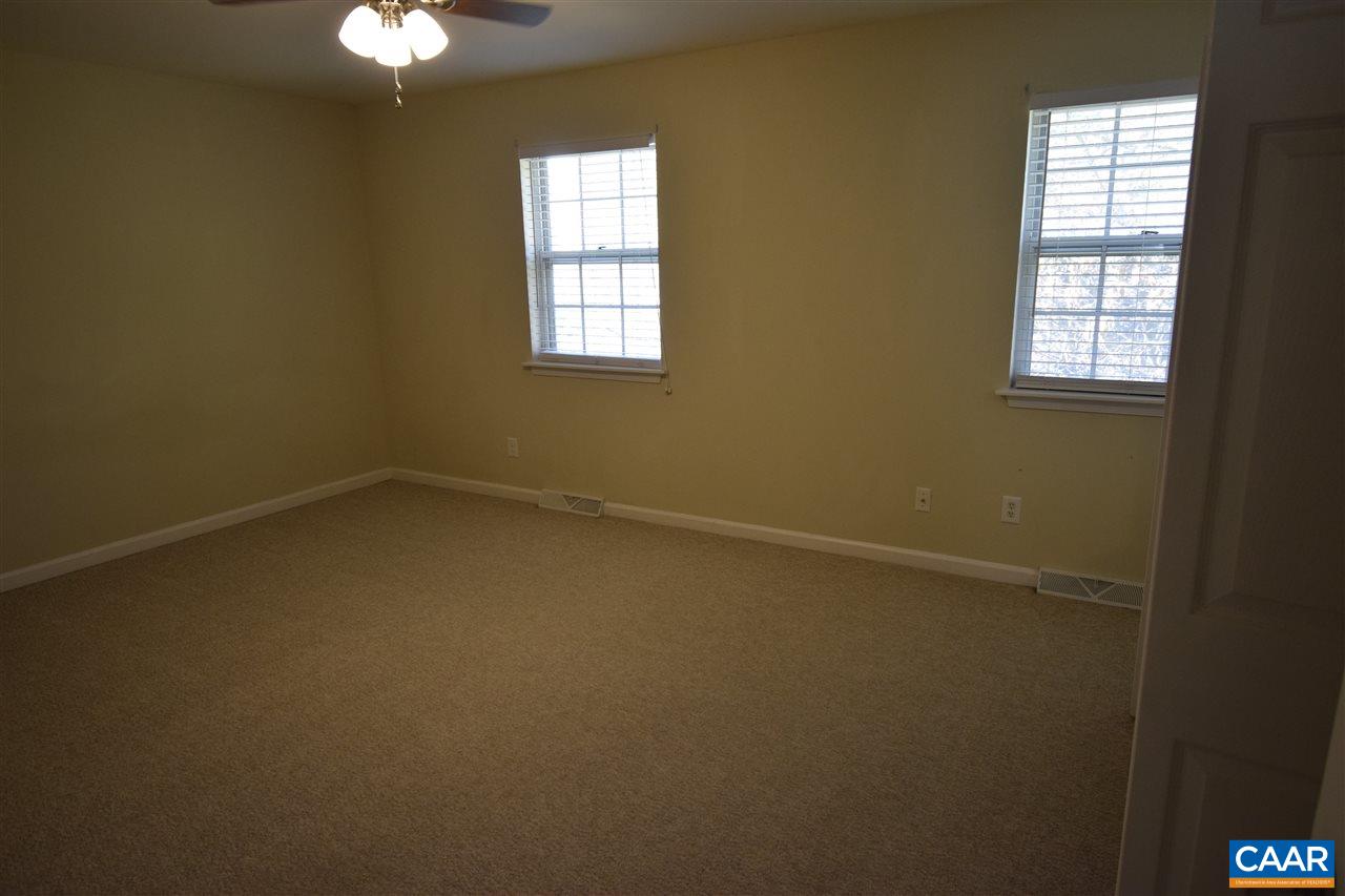 1640 Townwood Court Charlottesville, VA 22901 - Photo 9 of 11 an empty room with windows