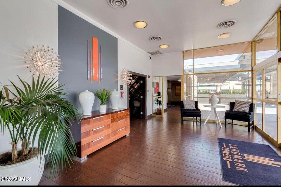 4750 North Central Avenue, Unit L8 Phoenix, AZ 85012 - Photo 25 of 55 a lobby with furniture and wooden floor