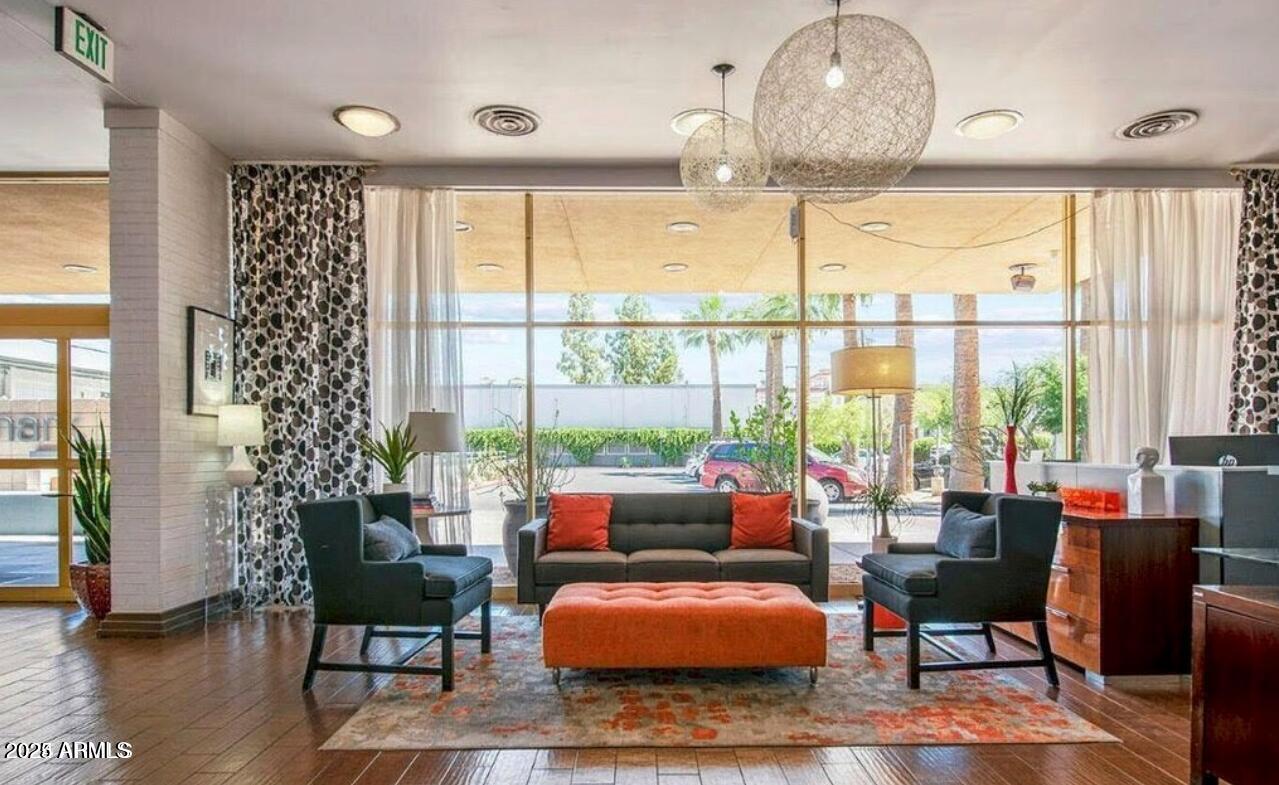 4750 North Central Avenue, Unit L8 Phoenix, AZ 85012 - Photo 27 of 55 a living room with furniture and a large window