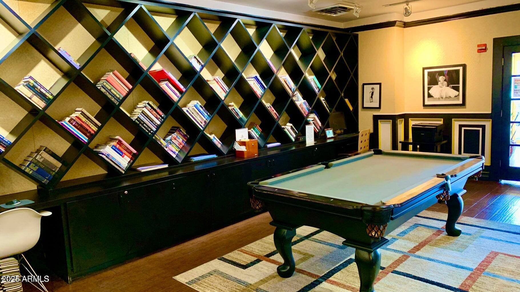 4750 North Central Avenue, Unit L8 Phoenix, AZ 85012 - Photo 28 of 55 a view of a room with furniture and wooden floor