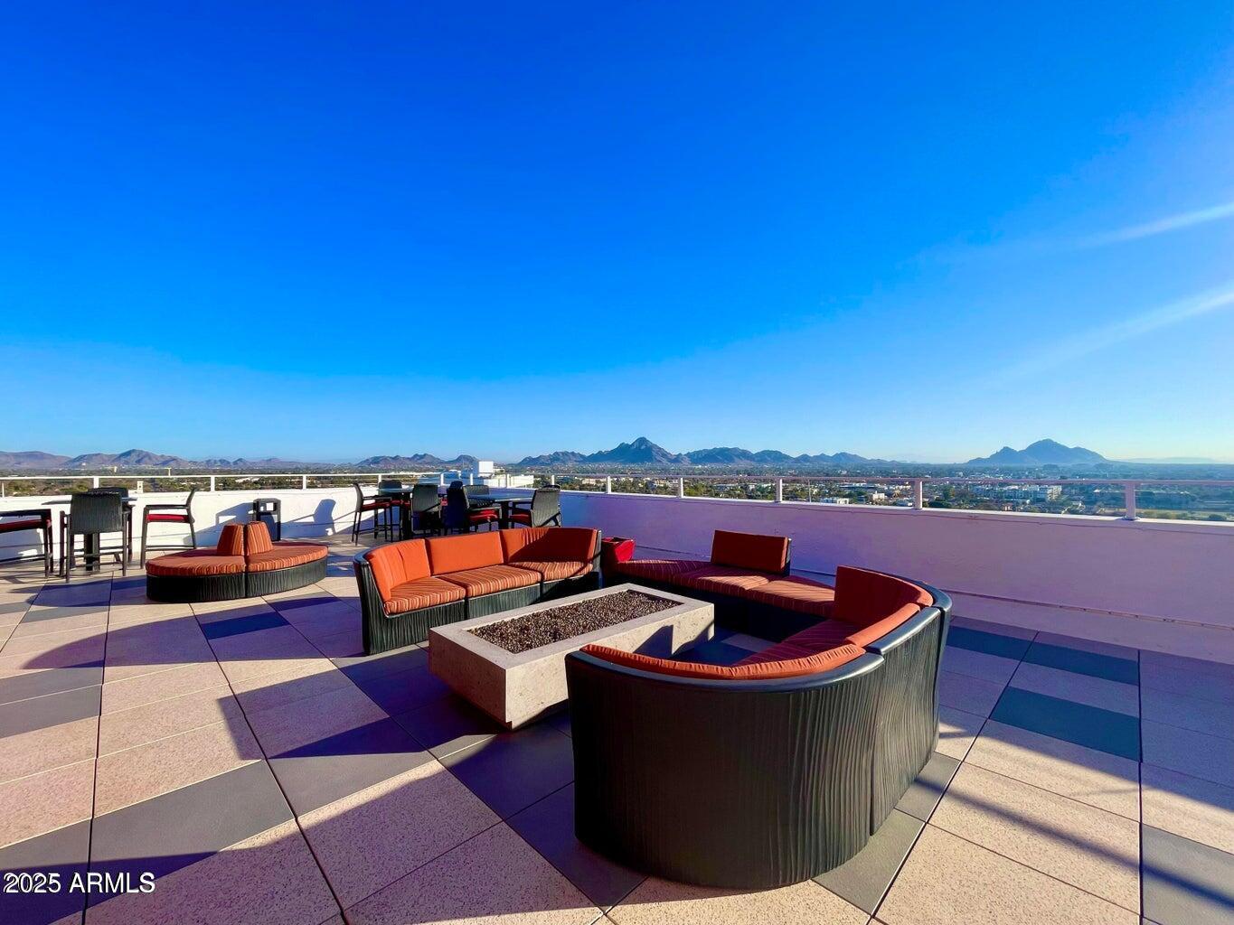4750 North Central Avenue, Unit L8 Phoenix, AZ 85012 - Photo 34 of 55 a view of a terrace with lawn chairs