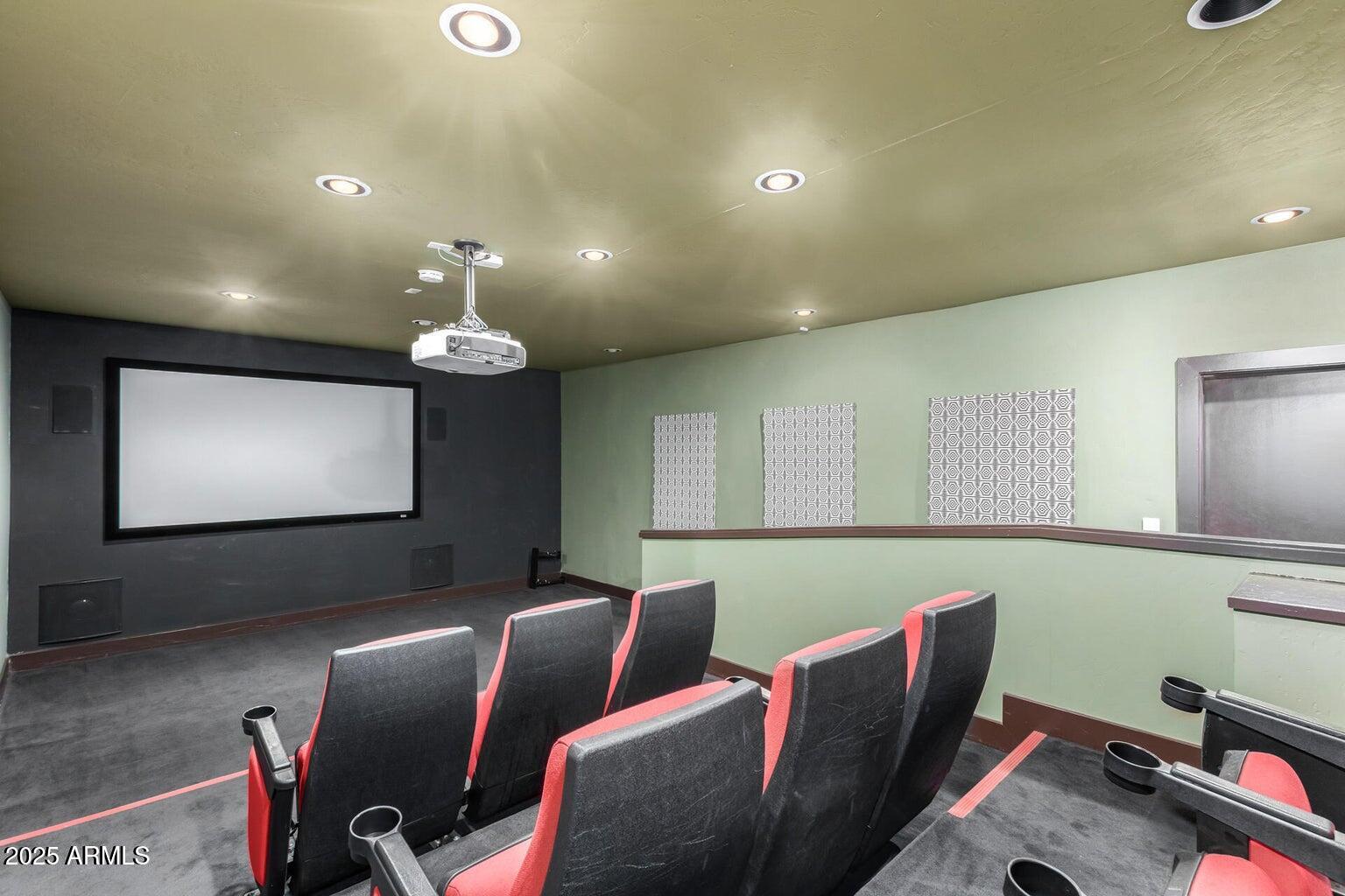 4750 North Central Avenue, Unit L8 Phoenix, AZ 85012 - Photo 37 of 55 a room with furniture projector and screen