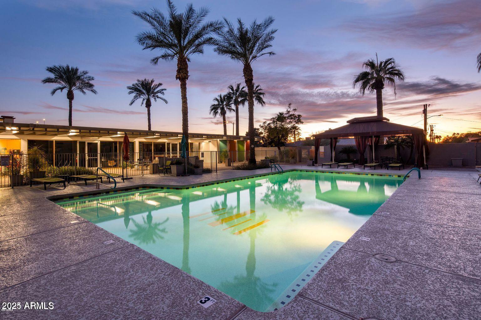 4750 North Central Avenue, Unit L8 Phoenix, AZ 85012 - Photo 42 of 55 a view of a swimming pool with a patio