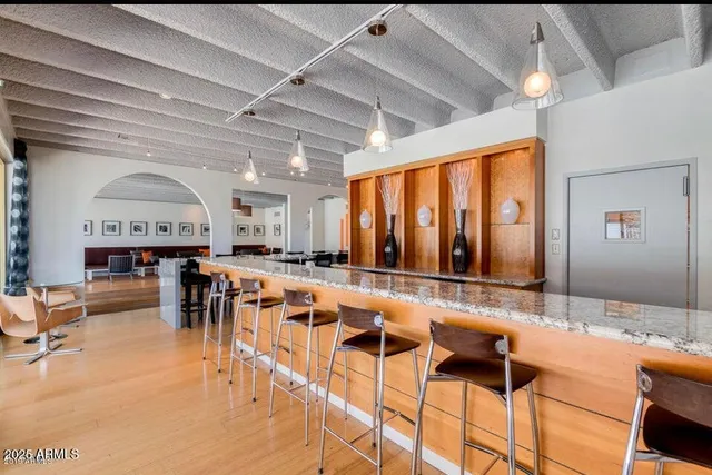 a view of a swimming pool with a lounge chairs