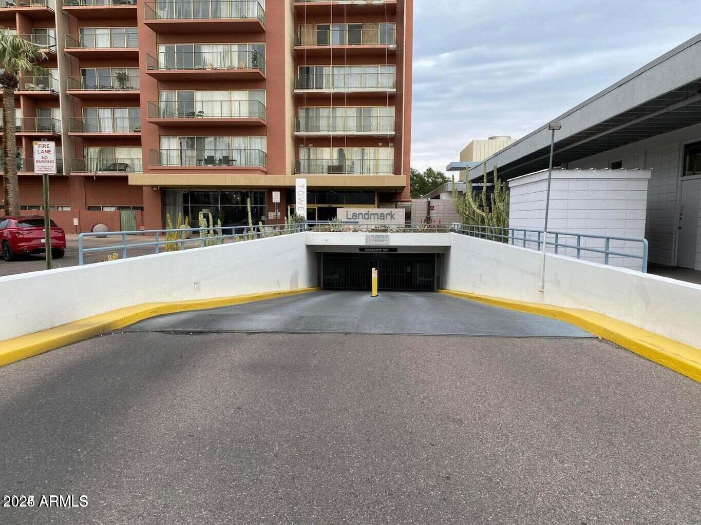 4750 North Central Avenue, Unit L8 Phoenix, AZ 85012 - Photo 52 of 55 a view of a swimming pool with a lounge chairs