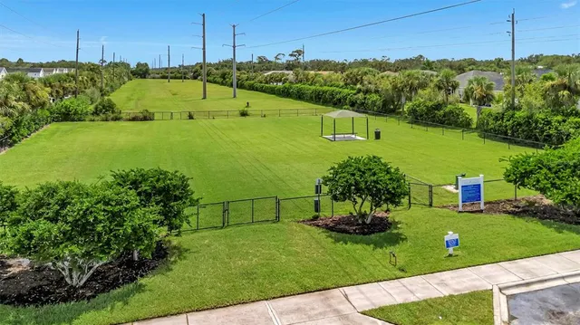 a living room with furniture and white walls