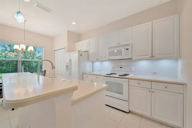 a bathroom with a toilet a sink and a mirror