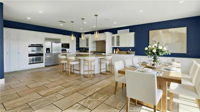 a view of a swimming pool with outdoor seating