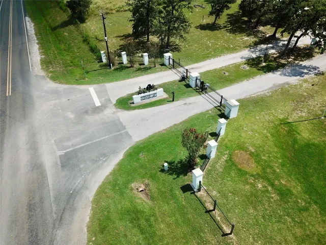 a view of a table and chairs in a garden