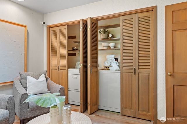 a bedroom with furniture and a window