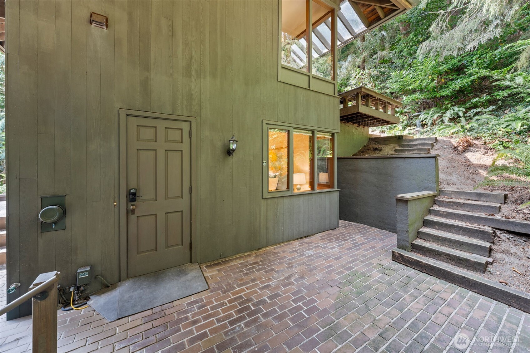 6 Lindley Road Mercer Island, WA 98040 - Photo 28 of 40 a view of a house with stairs and wooden floor