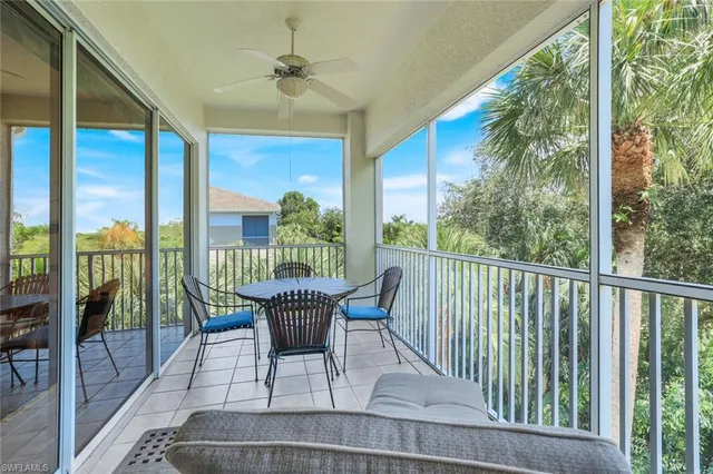 a view of balcony with furniture