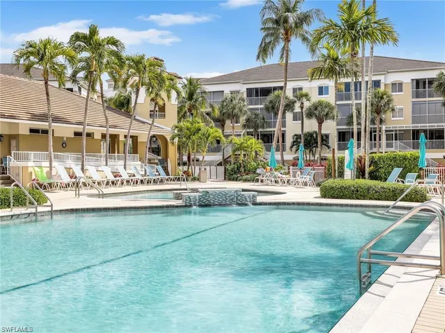 front view of a building with a garden