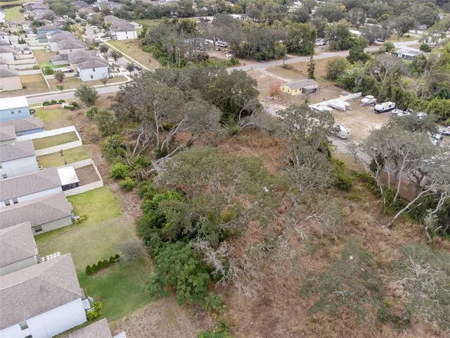 an aerial view of residential house with outdoor space