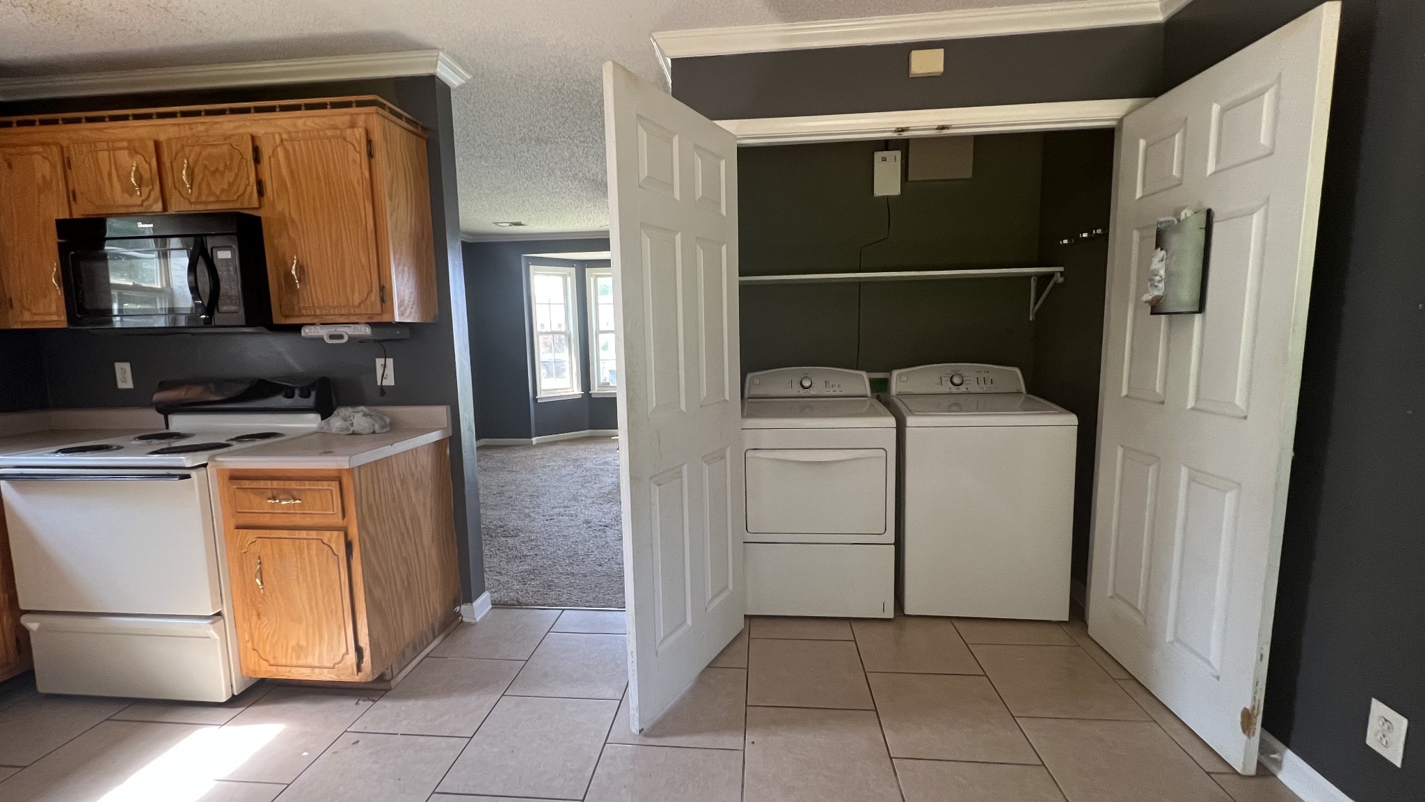 1047 Shadow Ridge Avenue Oak Grove, KY 42262 - Photo 7 of 15 a utility room with dryer and washer