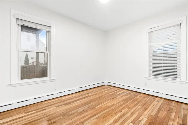 a view of a room that has a window in it
