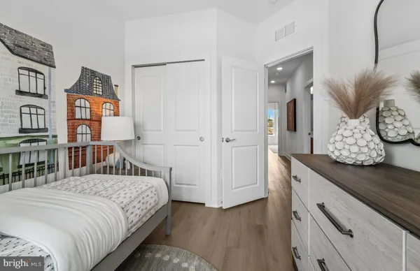 a bathroom with a granite countertop sink toilet and bathtub