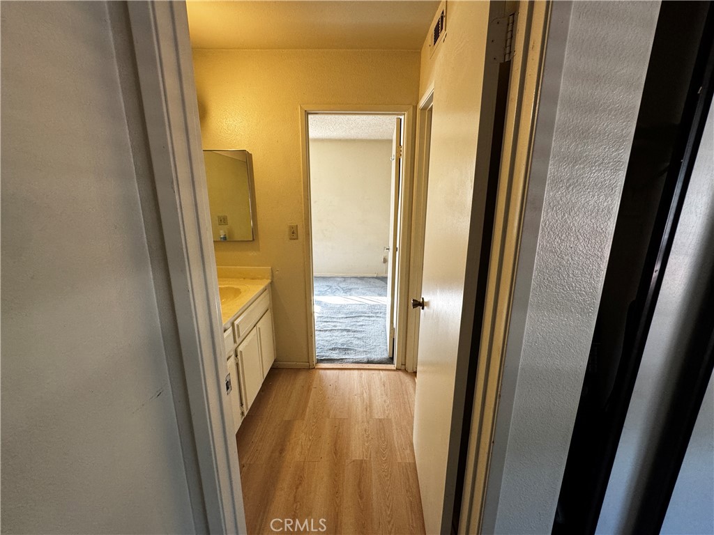 935 West Wabash Street Rialto, CA 92376 - Photo 15 of 17 a view of a bathroom from a hallway