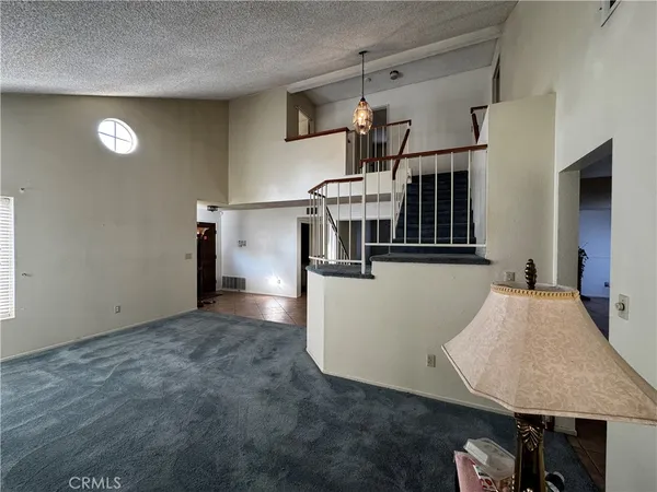 an entryway in a hall with a window