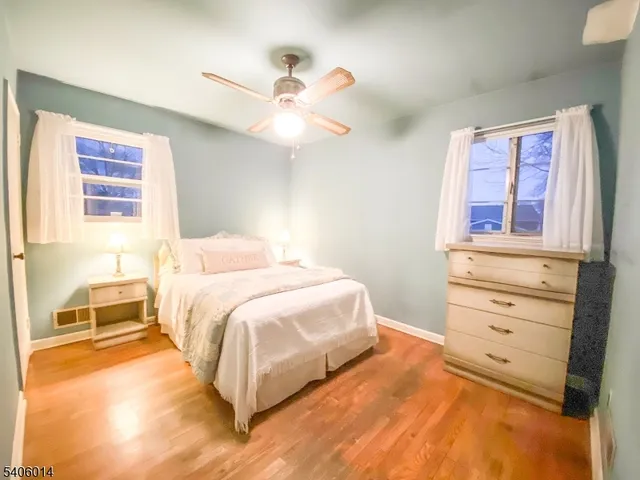 a bedroom with a bed and a cabinets