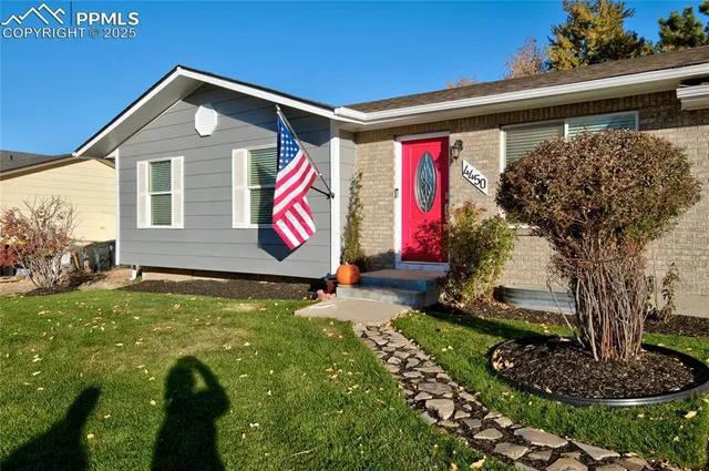 a front view of house with yard