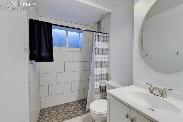 a view of a swimming pool with outdoor seating