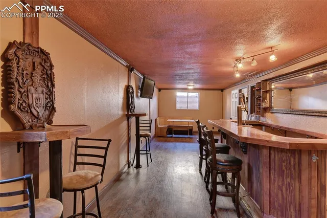 a kitchen with a sink and a stove top oven