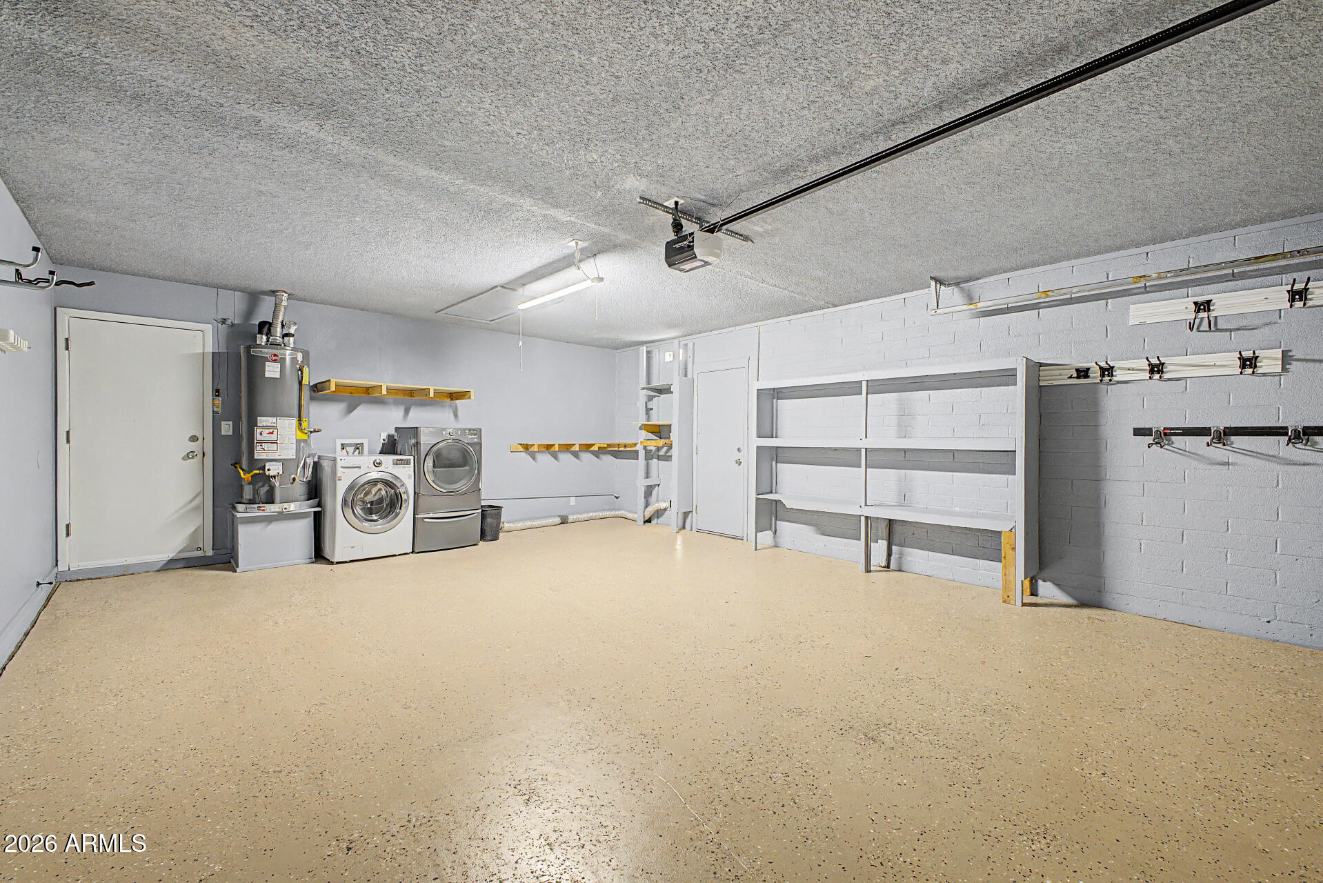 2332 East Riviera Drive Tempe, AZ 85282 - Photo 22 of 29 Epoxied garage w/ storage & laundry