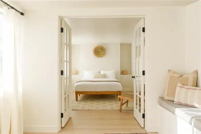 4622 Avenida La Mirada Joshua Tree, CA 92252 - Photo 15 of 22 a bedroom with a bed and a mirror