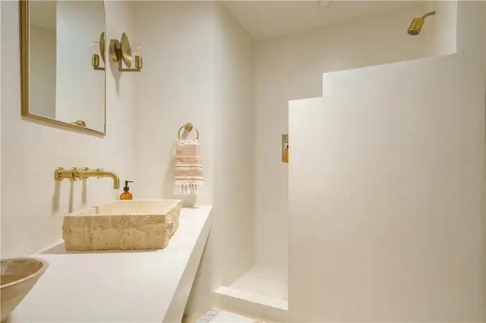 4622 Avenida La Mirada Joshua Tree, CA 92252 - Photo 16 of 22 a bathroom with a sink and a mirror