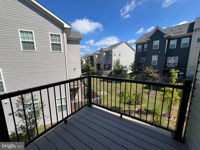a view of a brick building from a balcony