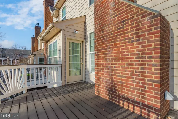 an aerial view of a house with yard swimming pool and outdoor seating