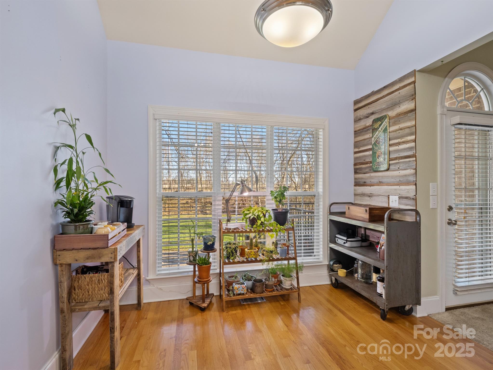 4739 Morris Glen Drive Concord, NC 28027 - Photo 15 of 40 a living room with furniture and a flat screen tv