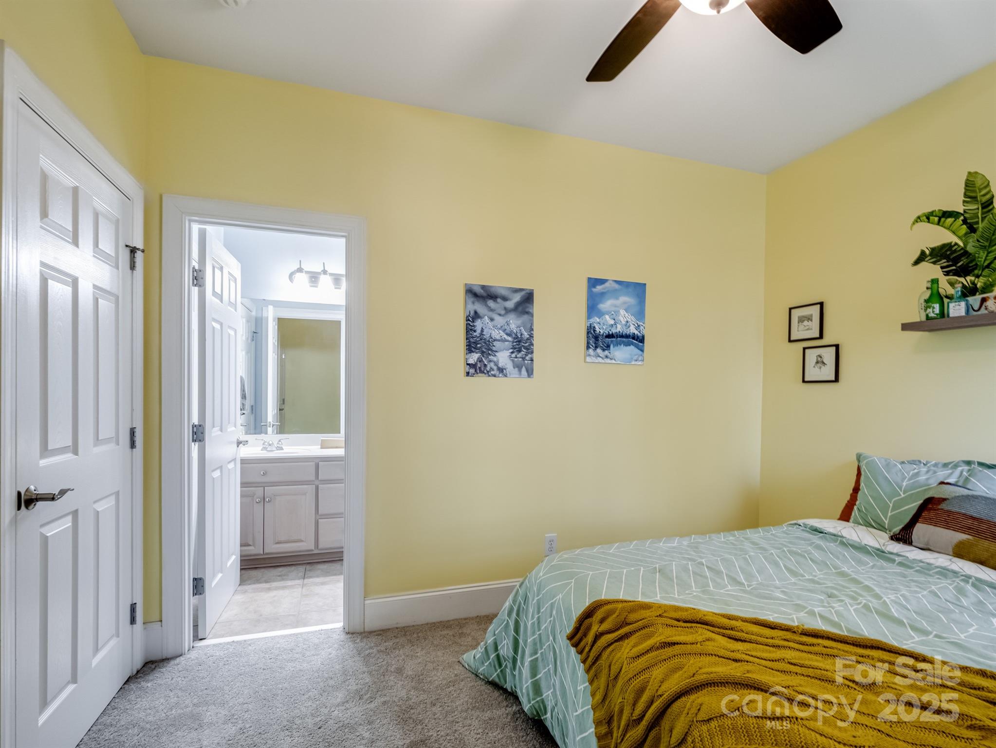 4739 Morris Glen Drive Concord, NC 28027 - Photo 25 of 40 a bedroom with a bed and painting on the wall