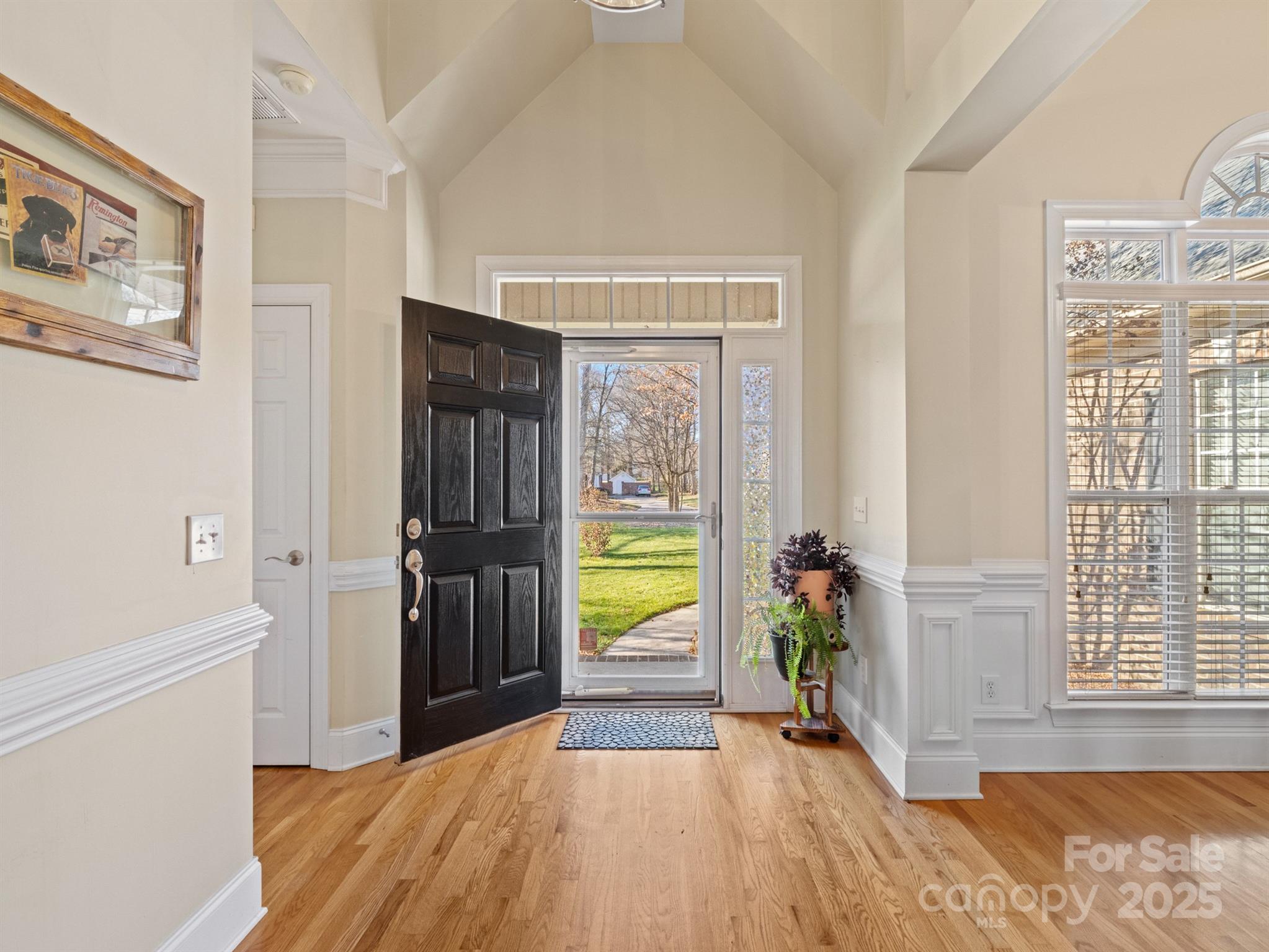 4739 Morris Glen Drive Concord, NC 28027 - Photo 3 of 40 a view of a hallway with furniture and a window