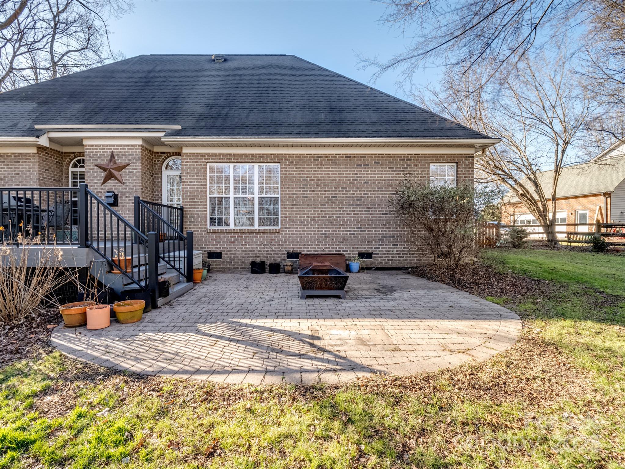4739 Morris Glen Drive Concord, NC 28027 - Photo 31 of 40 a view of a house with backyard and sitting area
