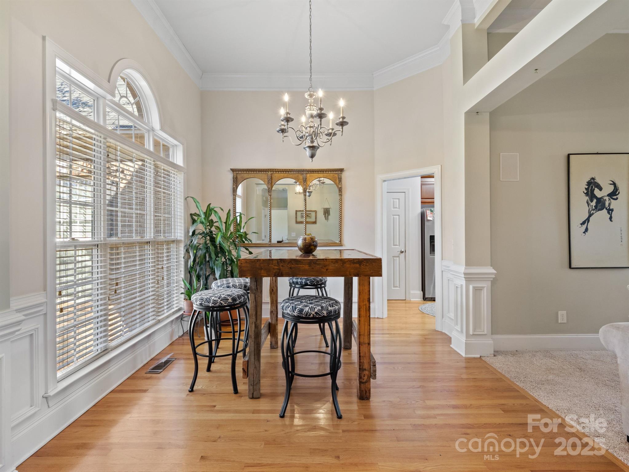 4739 Morris Glen Drive Concord, NC 28027 - Photo 5 of 40 a view of a a dining room with furniture window and wooden floor