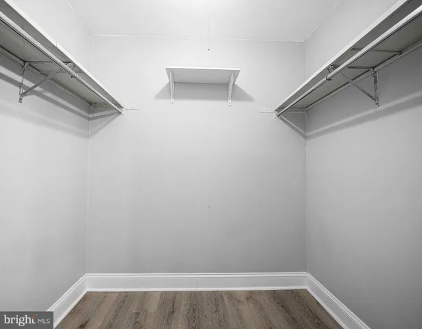 a view of a room with racks on the wall