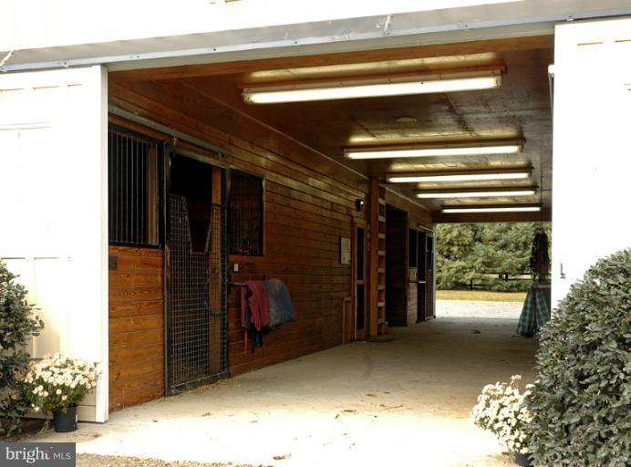 3892 Rectortown Road Marshall, VA 20115 - Photo 19 of 26 Center aisle barn with wash stall and feed room.