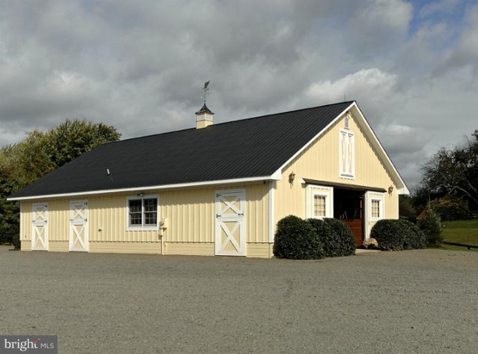 3892 Rectortown Road Marshall, VA 20115 - Photo 6 of 26 6-stall center aisle barn with heated tack room.