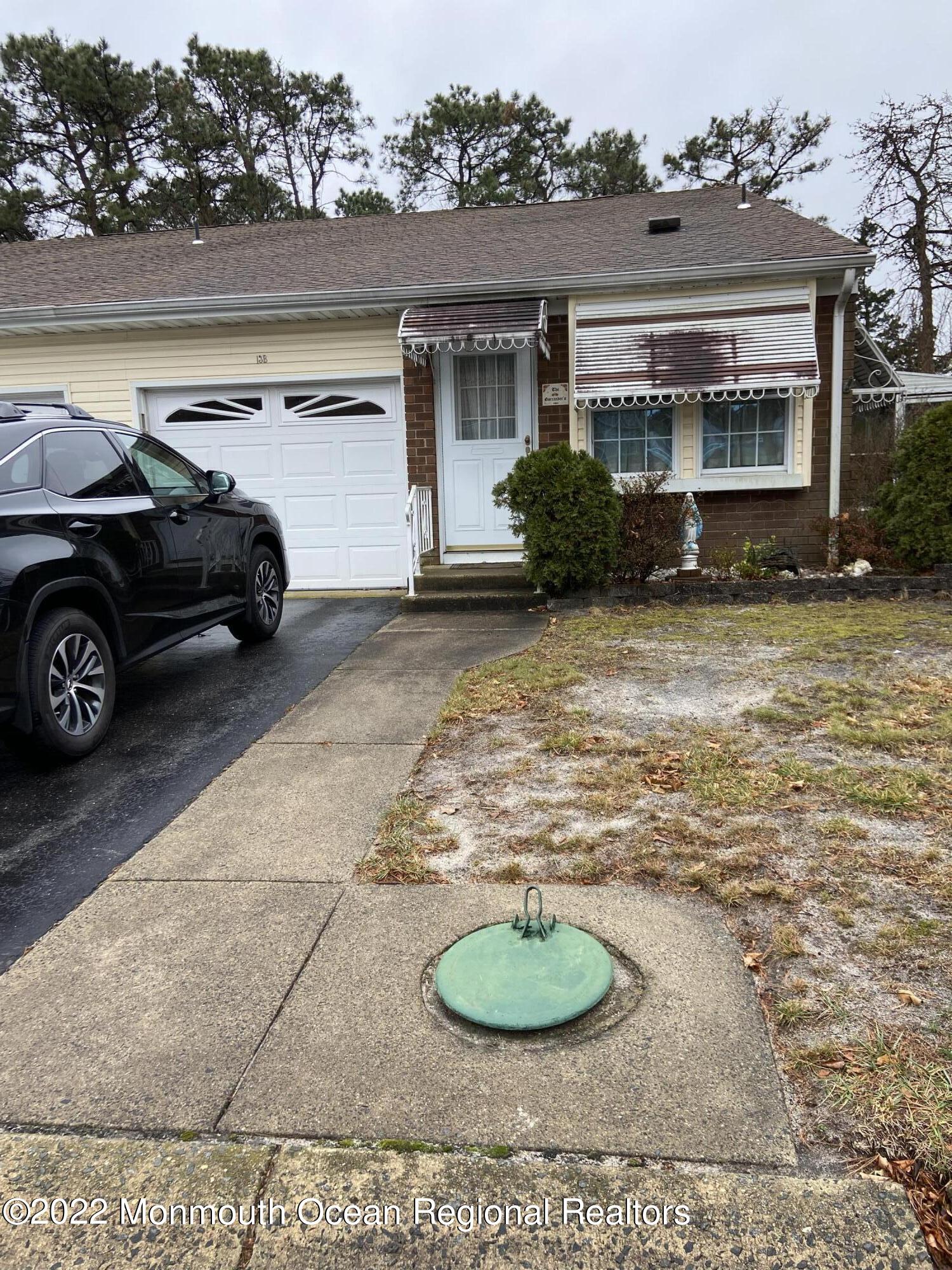 13 B Spring Street Whiting, NJ 08759 - Photo 1 of 14 a view of a car parked front of a house