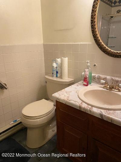 13 B Spring Street Whiting, NJ 08759 - Photo 14 of 14 a bathroom with a sink and a mirror