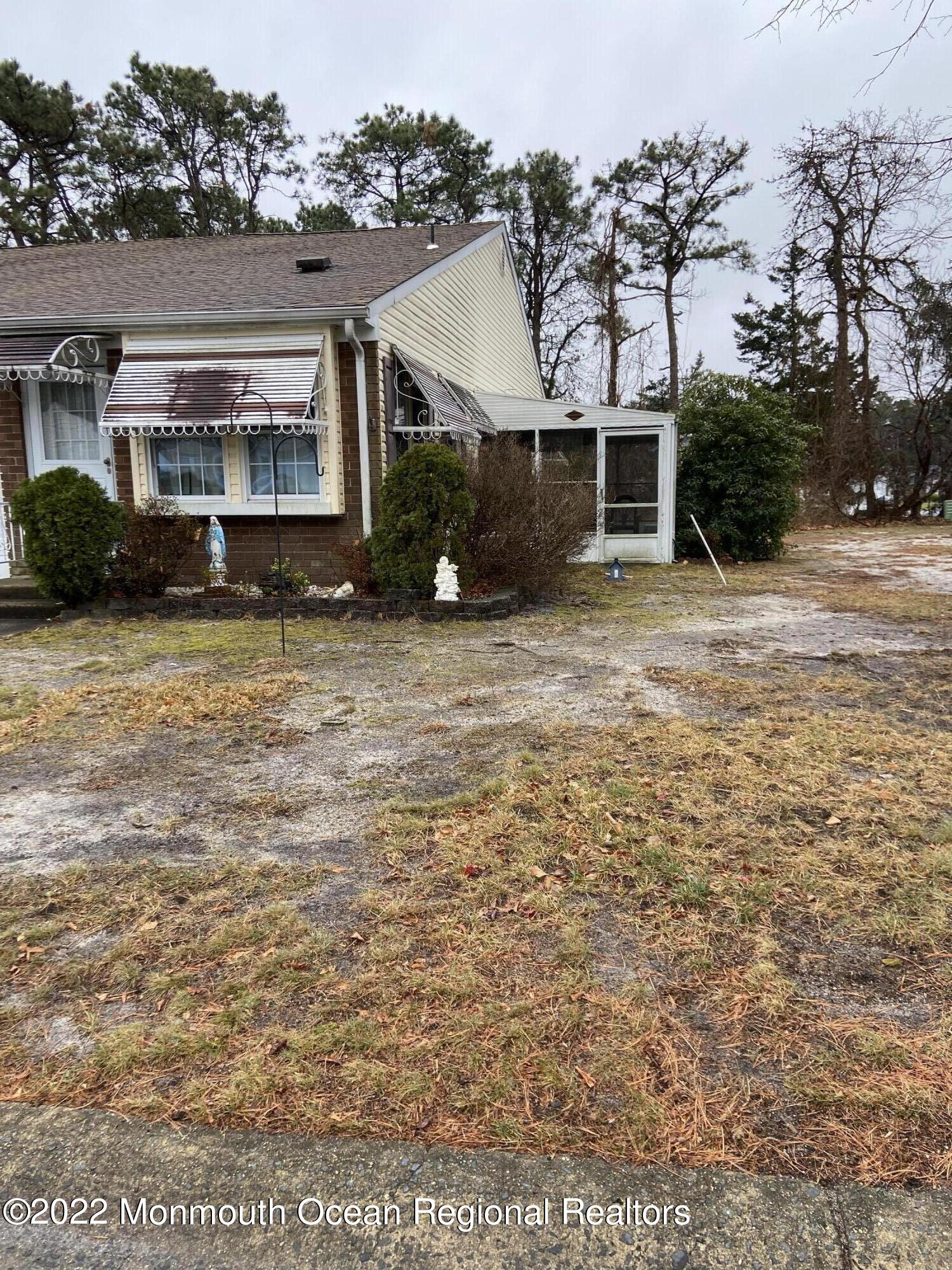 13 B Spring Street Whiting, NJ 08759 - Photo 2 of 14 front view of house with a yard
