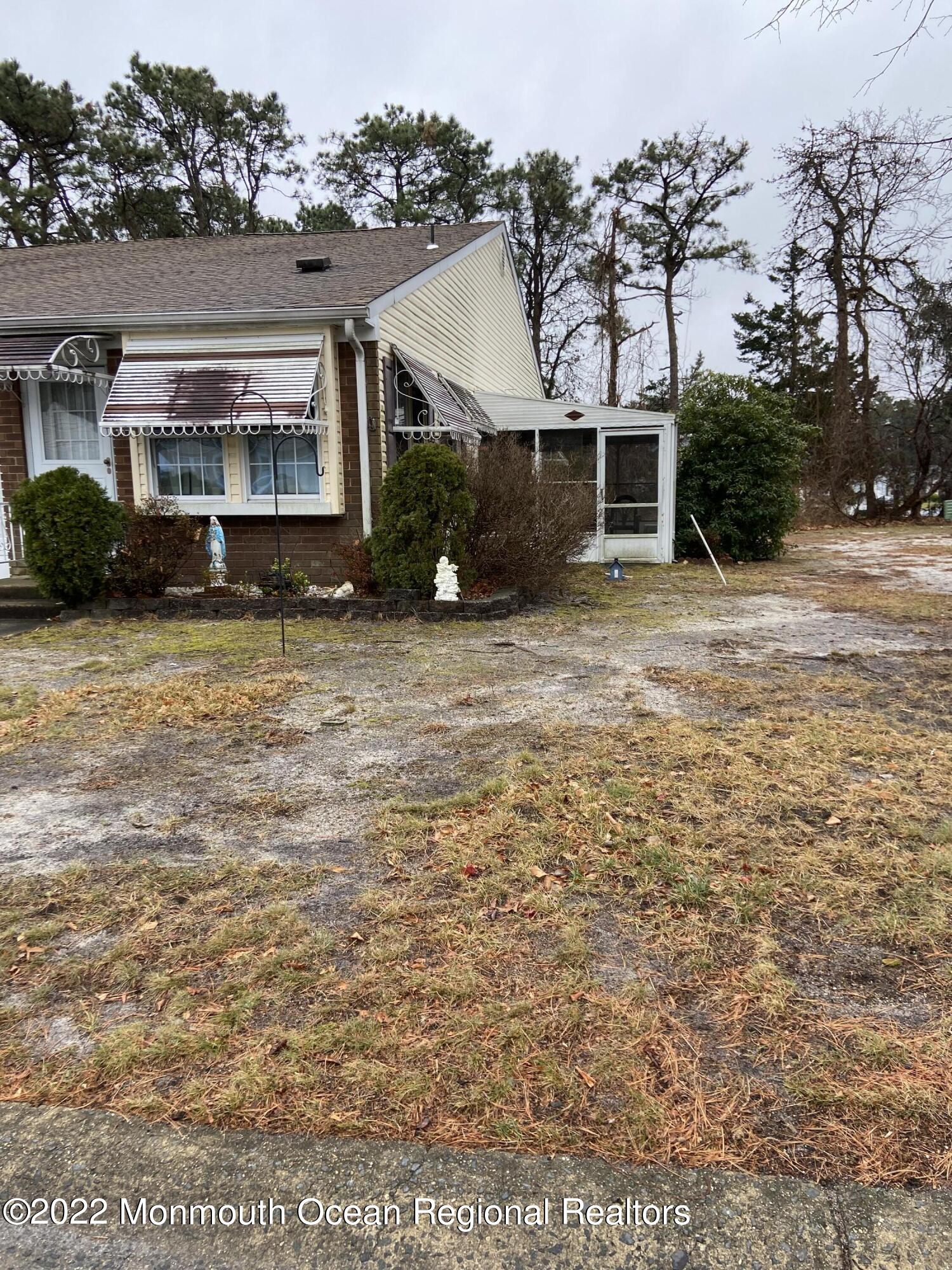 13 B Spring Street Whiting, NJ 08759 - Photo 4 of 14 front view of house with a yard
