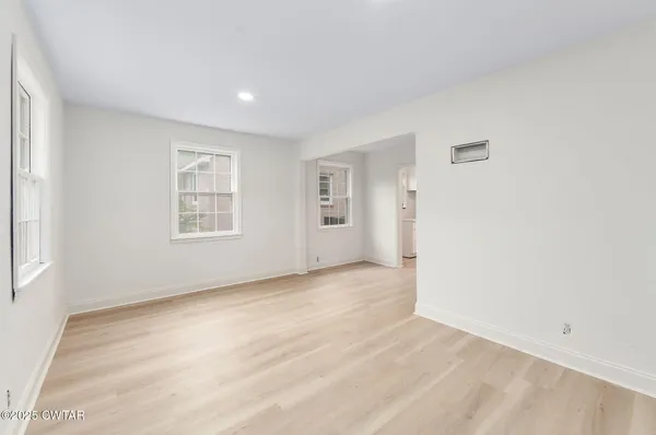 an empty room with windows